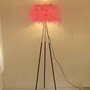 tripod floor lamp with pink feather shade